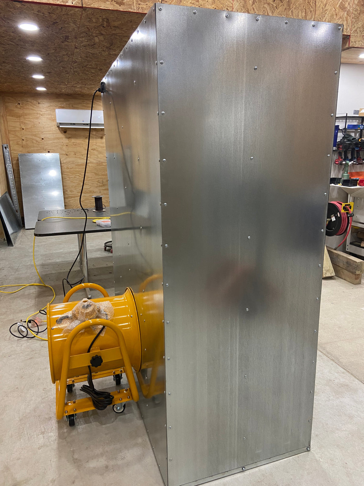 The 6x4x2 Deluxe spray booth from behind, with its 16-inch explosion-proof fan