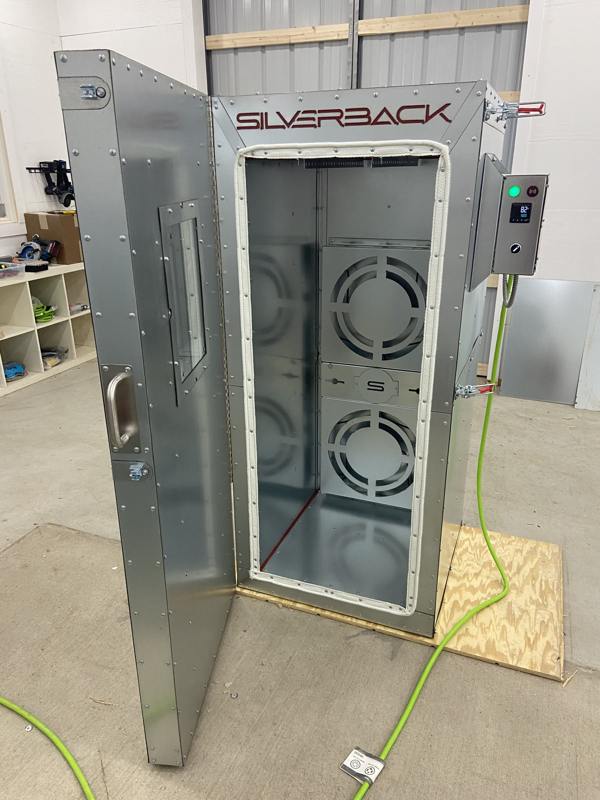 Silverback 5x2x2 powder coating oven with the door open and the insulated base installed