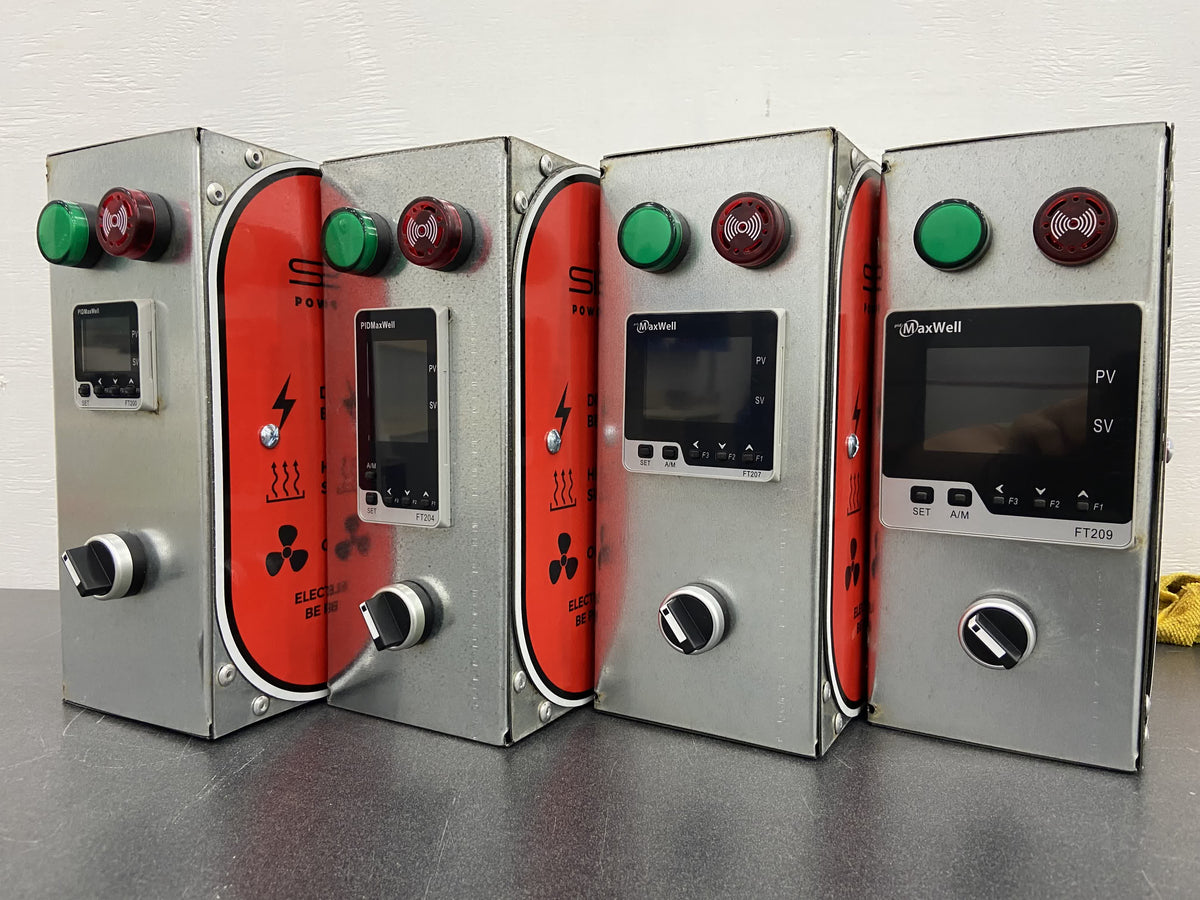 Four finished Silverback control boxes in a row