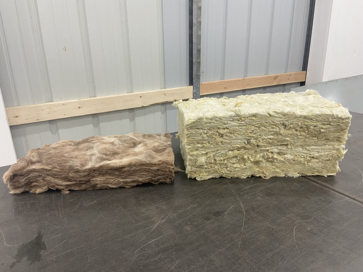 Thin competitor R11 fiberglass batt next to the thick R30 rockwool block Silverback uses in the 6 inch oven top
