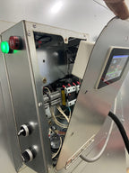 Touchscreen PID controller with the hinged cover open, wiring channel visible